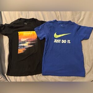 Two Boys size small Nike shirts